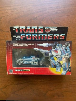 1985 Transformers G1 Mirage 100 Complete.  Includes Insert.