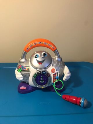 Fisher Price Fun 2 Learn Sing - Along Animated Light Up Learning Dj Animated