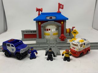 Geotrax Fire Station Police Car Fire Engine Fireman Police Man Tow Truck Driver