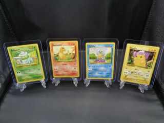 1999 Pokemon Base Set Starters: Pikachu,  Bulbasaur,  Charmander,  Squirtle
