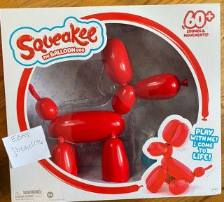 Squeakee The Balloon Dog Pet - Red Robot Toy In Hand