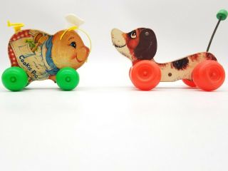 Fisher Price Little Snoopy & Cookie Pig 1960’s Bobbing Wood Pull Toys