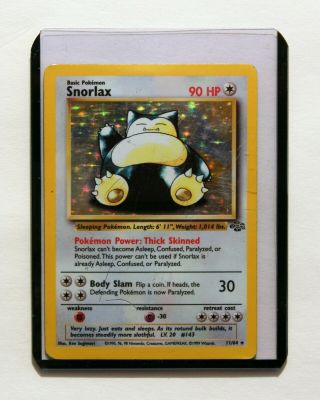 First Edition Snorlax 11/64 Holo Rare Jungle Set Pokemon Card Heavily Played