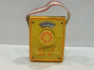 1960’s Vintage Fisher Price Music Box Pocket Radio " Raindrops Keep Fallin.  ”