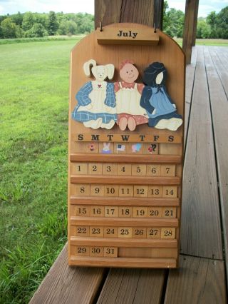 Perpetual Wooden Wall Calendar With 3 D Doll Figures