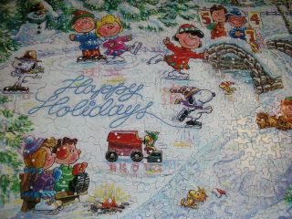 500 piece.  Springbok Puzzle.  Snoopy ' s Holiday Greeting.  20 X 27.  colorful 2