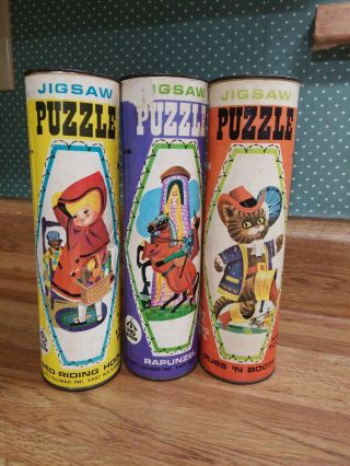 Vintage Hg Toys Puzzles In Canisters Puss Boots Little Red Riding Hood Rapunzel