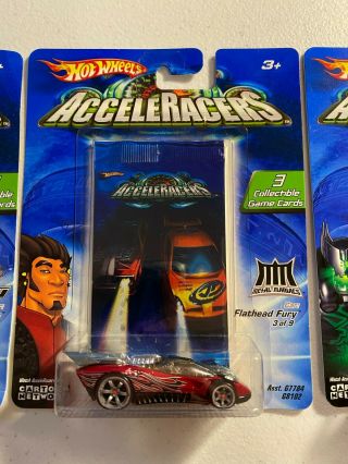 3 Hot Wheels Acceleracers In Package,  Flathead Fury,  RD10,  and High Voltage 3