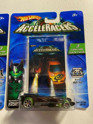 3 Hot Wheels Acceleracers In Package,  Flathead Fury,  RD10,  and High Voltage 4
