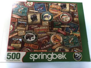 Springbok 500 Piece Jigsaw Puzzle: Lodge Signs Camping & Fishing 18 " X23.  5 "