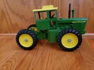 John Deere 7520 4 Wheel Drive Toy Tractor.  1/16 Scale.