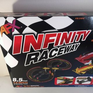 Tomy AFX Infinity Raceway with Mega G - Plus Cars and Tri - Power Pack 3