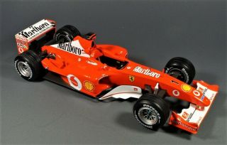 Michael Schumacher Ferrari F2002 Hot Wheels Elite Esc.  1/18