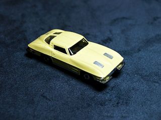 Aurora T - Jet,  Slot Car.  63 Corvette Yellow.  Running