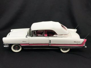 The Franklin 1:24 Scale 1955 Packard Clipper Caribbean Convertible Pink Car
