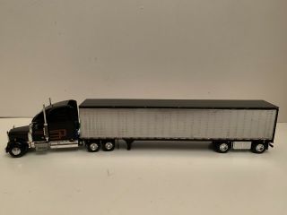 1/64 First Gear Freightliner Classis W/dcp 53’ Spread Axel