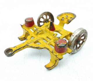 Yellow Arcade Cast Iron Plow With Seat Vintage Farm Implement Toy Corn Planter