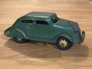 Girard Marx 5 1/2 Inch Pressed Steel Vehicle Chrysler Airflow Friction Toy