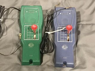 Two.  Vintage Marx 2238 Slot Car Stick Shift Controllers