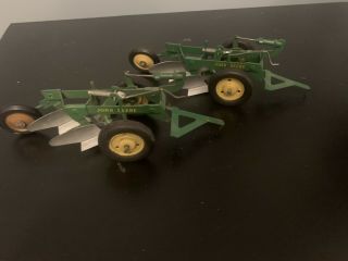 (2) Vintage Eska John Deere Metal Farm Toy Tractor