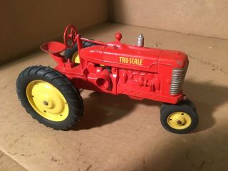 Vintage Tru Scale tractor really,  some paint loss.  Orange and yellow. 2