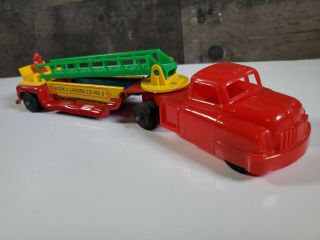 Wyandotte Toys Fire Department Hook & Ladder Truck 3.  Plastic Cab w/rear Driver 3