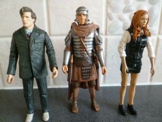 Doctor Who - 3 X 11th Doctor Figures - The Dr,  Amy Pond As Police & Rory Roman