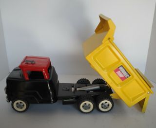 Structo Hydraulic Dump Truck - Pressed Steel Construction Yellow/black/red