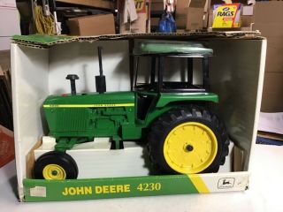 Ertl - John Deere 4230;tractor,  Has 3 Point,  1:16 Scale,  Die - Cast,  Pre Owned,