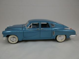 Collectible 1:18 Scale Blue 1948 Tucker Torpedo Diecast Car By Road Legends