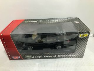 Motor Max 1:18 Scale Jeep Grand Cherokee Diecast Black With Tan Interior