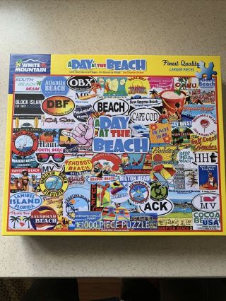 Two White Mountain 1000 Piece Puzzles: A Day At The Beach and Exotic Travels 2