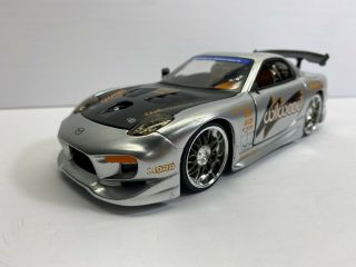 Jada Toys 1:24 Scale 1985 Mazda Rx - 7 Wilwood Edition Loose Diecast Nores