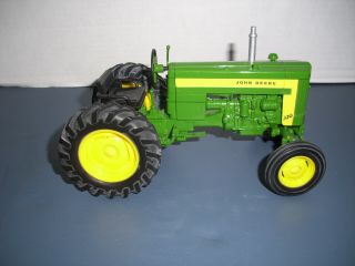 Ertl John Deere 320 1/16 Scale Tractor Farm Toy.  No Box.