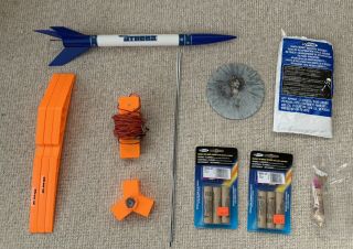 Model Rocket Set With Rocket,  Launch Pad,  And Engines