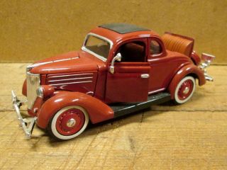 1936 Ford Deluxe 5 Window Coupe,  Die Cast Toy,  5.  75 " Long