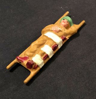 Vintage Manoil Die Cast Wounded Toy Soldier On Stretcher Model 540