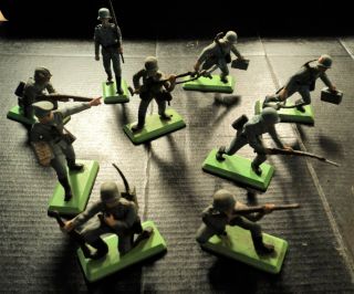 9 - Vintage Britains Infantry Type Hard Rubber Toy Soldiers They Look German