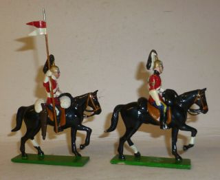 Two Unidentified Solid White Metal Mounted Life Guards