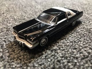 Auto World 1976 Cadillac Coupe Deville Collectible 1/64 Scale Diecast - Yatclub