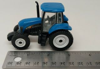 Ertl - Blue Tg215 Holland Tractor - 1:64 Scale (loose)