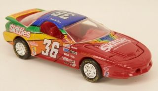 Racing Champions 1996 Pontiac Firebird Trans Am Ram - Air Skittles 1/64 Scale