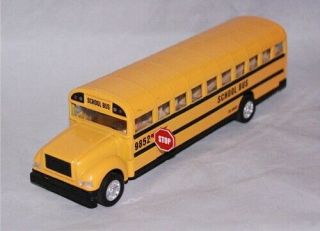 Die Cast Yellow School Bus With Pull Back Action 8 1/4 Inch Doors,