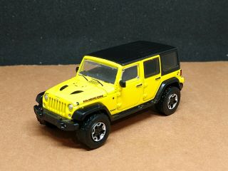 2015 Jeep Wrangler Unlimited Rubicon Hard Rock Collectible 1/64 Limited Ed.  Ylw