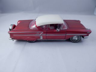 Saico 1958 Chevy Impala 1:24 Diecast Model Car - Red With White Roof