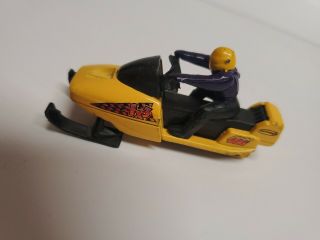 Mattel Matchbox 1999 Snowmobile,  Yellow Body,  Black Seat,  Purple Rider