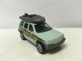1999 - 2004 Jeep Grand Cherokee Limited 4x4 Collectible 1/64 Scale Diecast