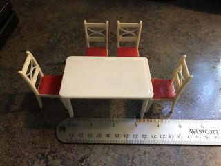 Vintage Renwal Miniature Dollhouse Chairs (4) With A Plasco Toy Table.