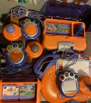2 Vtech V.  Smile Tv Learning Systems 3 Controllers Wth 4 Games /art Studio