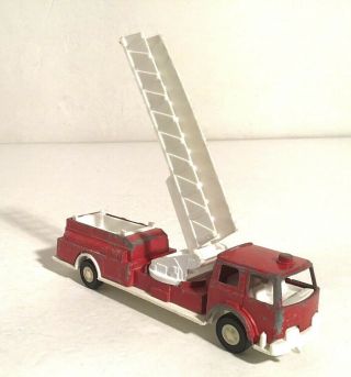 Vintage 61/2 " Red Iron Toy Fire Truck W/ White Extendable Ladder By Tootsie 1970